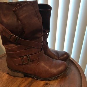 Brown boots with buckle detail